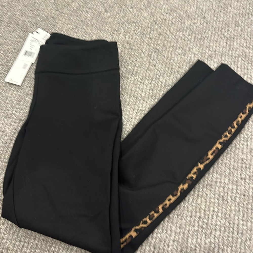 Black pull on pants with leopard.